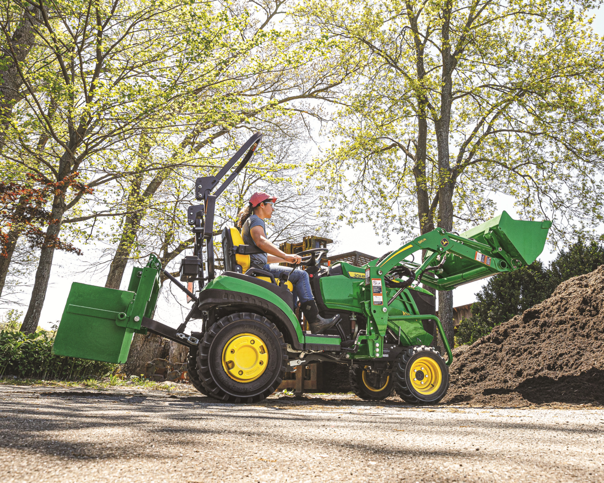 John Deere 1025r With Backhoe The Ultimate Compact Utility Tractor For Demanding Applications 1
